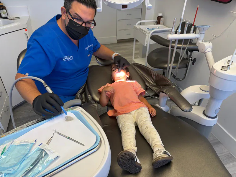 Child receiving professional dental fillings from Dr. Sepehr Nassiripour in Beverly Hills